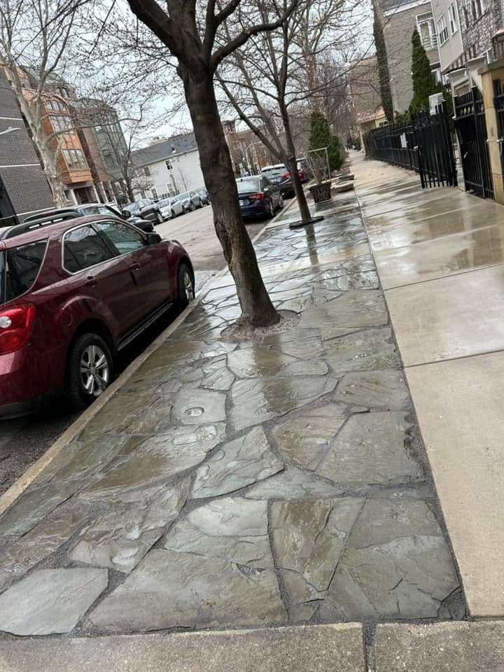 Stamped concrete sidewalk with a flagstone pattern